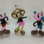 Cuphead og félagar. Bræðurnir Cuphead og Mugman með vinkonu sinni, henni Chalice. Stærð 14 cm Öll saman á 30.000 kr. Annars seljast þau á 12.000 kr. stk. hver um sig.